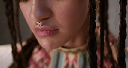 Horizontal video: A close up video of a woman with nose piercing 10283796. Duration: 28 seconds. Resolution: 4096x2160
