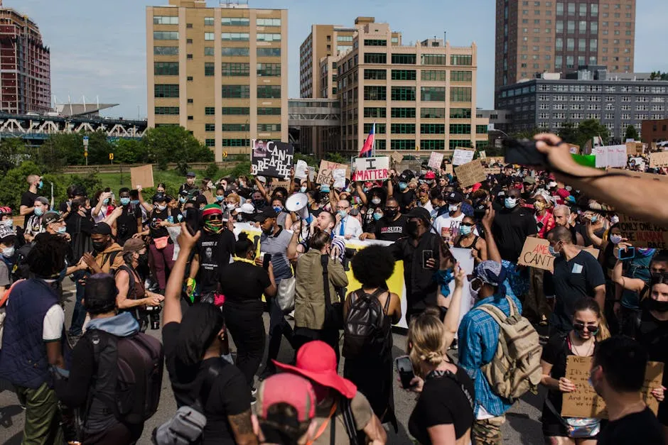 Crowd of Protesters Holding Signs