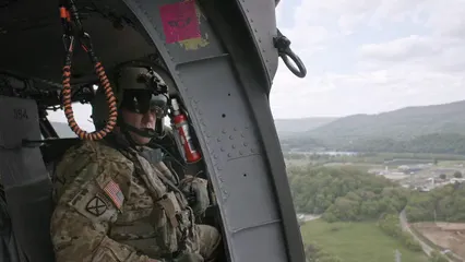 Horizontal video: Soldier in helicopter 12103315. Duration: 15 seconds. Resolution: 3840x2160