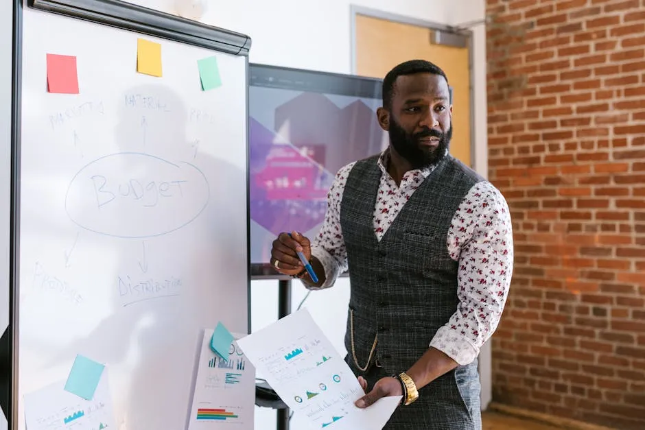 A Man Standing Near the White Board