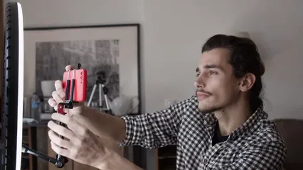 Horizontal video: A man setting up the smartphone 7514227. Duration: 11 seconds. Resolution: 3840x2160
