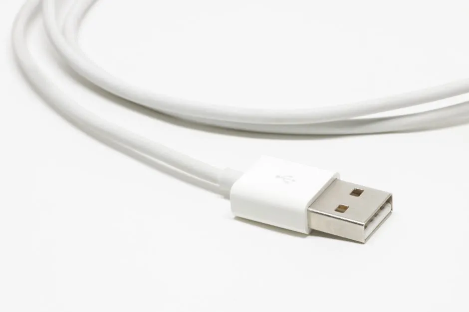 A detailed view of a USB cable, ideal for technology-related usage.