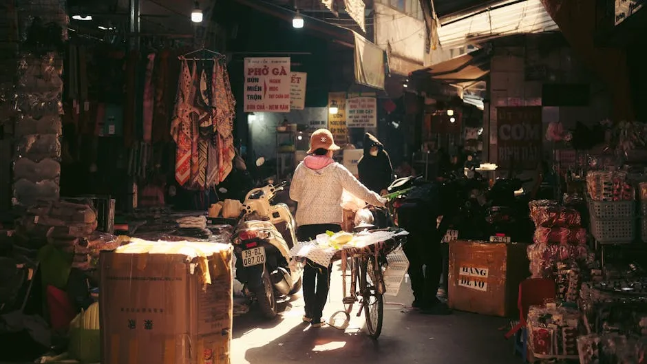 Vibrant market street with people and goods in Hà Nội, Vietnam