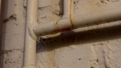 Horizontal video: Water dripping on welded metal pipes 5571839. Duration: 10 seconds. Resolution: 1920x1080