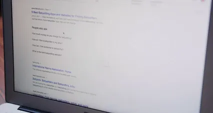 Horizontal video: Searching the internet for a babysitter 6986417. Duration: 28 seconds. Resolution: 4096x2160