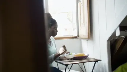 Horizontal video: A woman eating healthy foods at home 8171533. Duration: 11 seconds. Resolution: 3840x2160