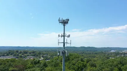 Horizontal video: Drone video of a communication tower 13221290. Duration: 47 seconds. Resolution: 2688x1512