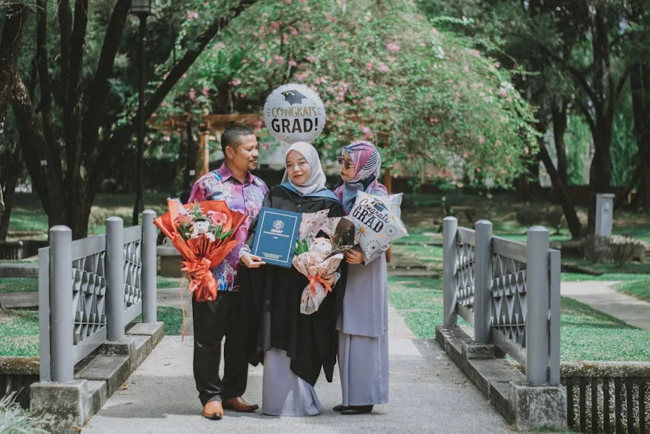 Father and Mother with Graduate Daughter in Park