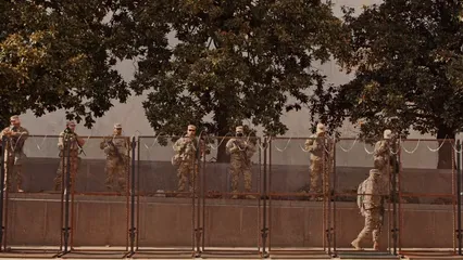 Horizontal video: Wall of soldiers carrying guns 6581403. Duration: 26 seconds. Resolution: 3840x2160