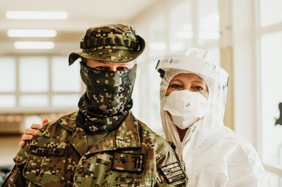 Soldier and Medical Front Liner Looking at Camera