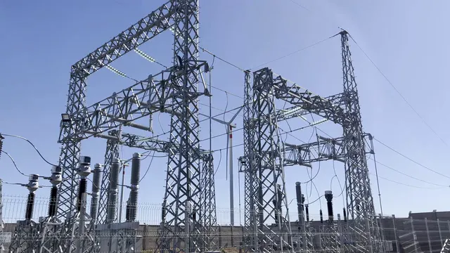 Horizontal video: A large electrical substation with several power lines 27844418. Duration: 8 seconds. Resolution: 3840x2160