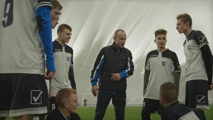 Horizontal video: Football players listening to their coach 6078634. Duration: 12 seconds. Resolution: 3840x2160
