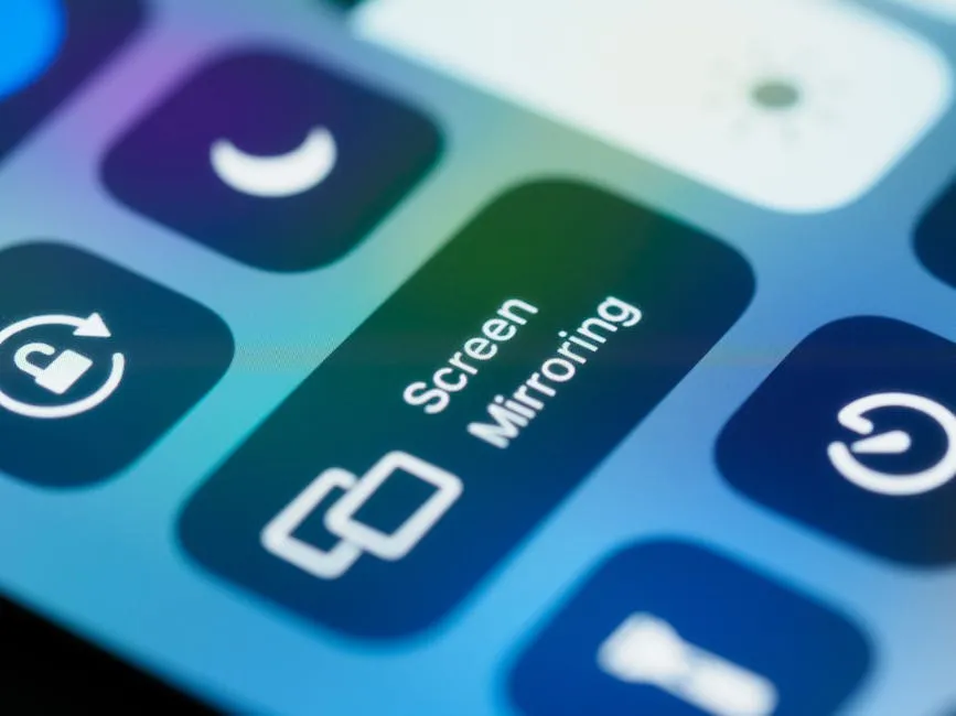 Detailed close-up of a smartphone screen highlighting the screen mirroring feature and controls.