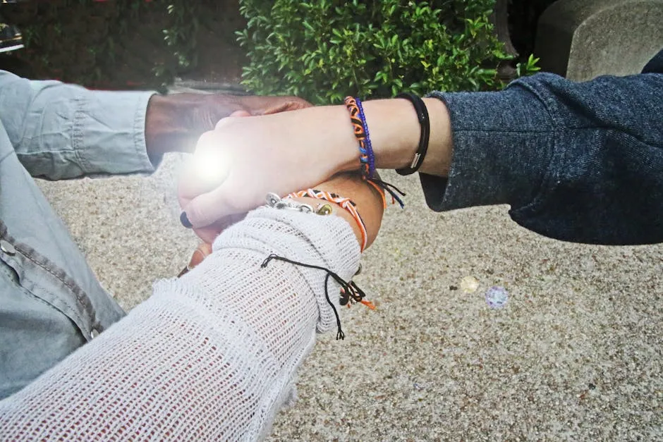 Three People Holding Each Other's Hands