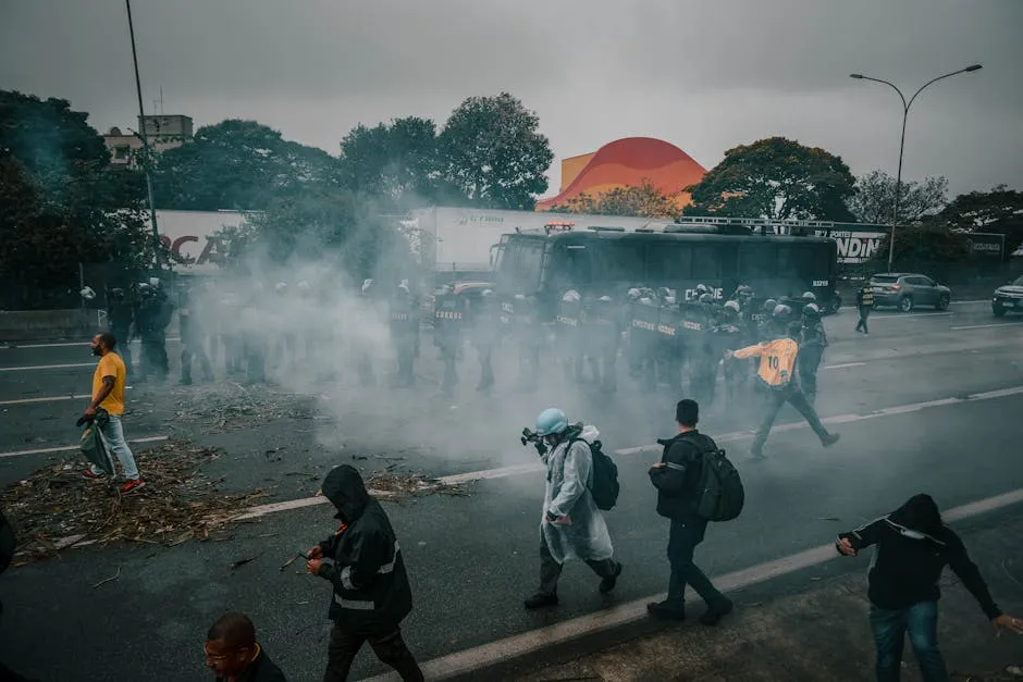 Photo of a Demonstration and a Police on a Road