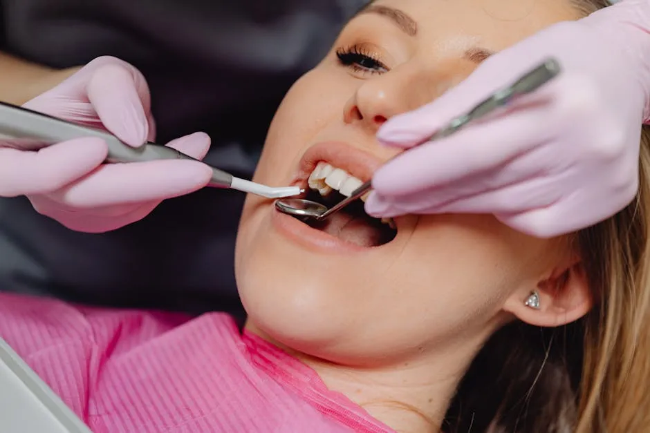 Photo of a Woman Getting a Dental Check Up