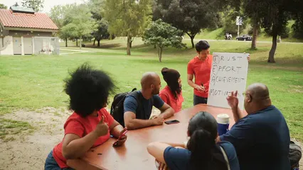 Horizontal video: A young man giving a motivational speech to a group of people 7551530. Duration: 12 seconds. Resolution: 1920x1080